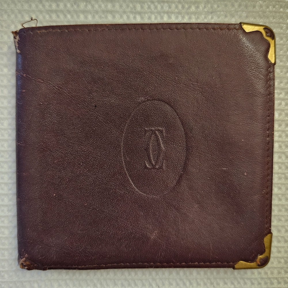 Cartier Wine Red Bifold Leather Wallet with Gold Accents